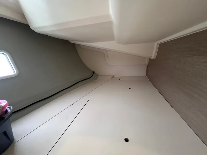 Slide: The Image of Interior cabin space of a 2021 Hanse 418 yacht, featuring sleek design and modern finishes. - 19