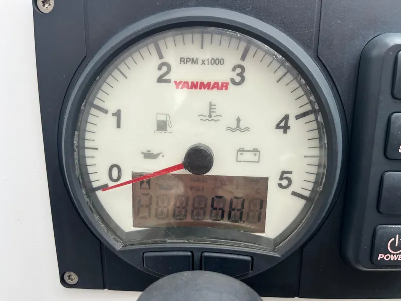 Slide: The Image of Tachometer on 2021 Hanse 418 sailboat, displaying engine RPM and indicators. - 22