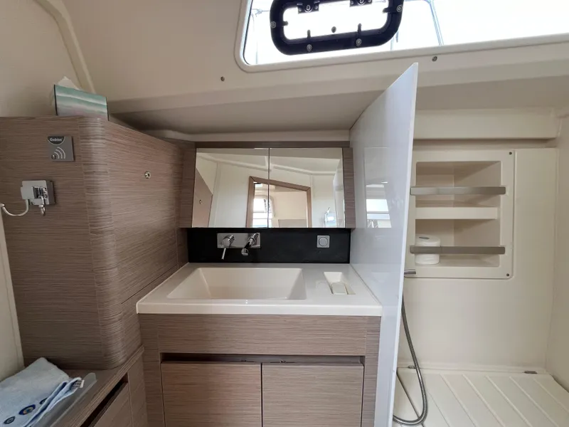 Slide: The Image of Modern bathroom interior of 2021 Hanse 418 yacht with sink and storage. - 26