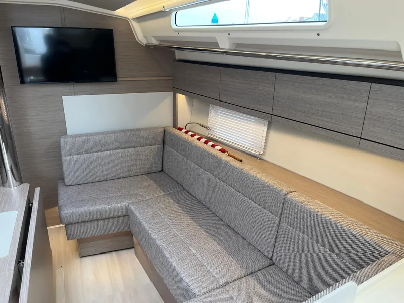 Slide: The Image of Modern interior of 2021 Hanse 418 yacht with cozy seating and wall-mounted TV. - 31