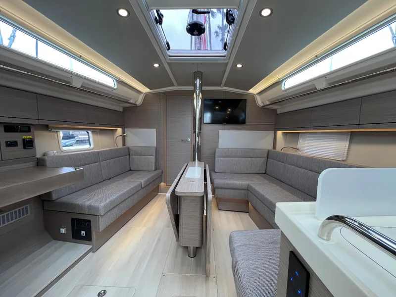 Slide: The Image of Luxurious interior of 2021 Hanse 418 yacht with modern seating and skylight. - 28