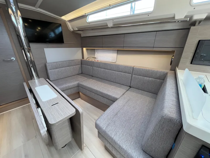 Slide: The Image of Modern interior of 2021 Hanse 418 yacht with sleek gray seating and cabinetry. - 29
