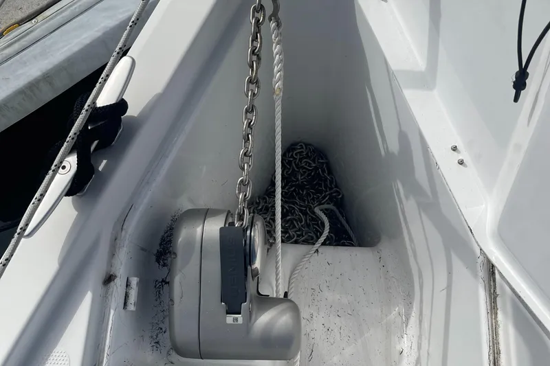 Slide: The Image of Anchor chain and winch on 2021 Hanse 418 sailboat deck. - 3