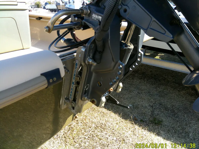 Slide: The Image of Outboard motor mount on 2017 Jones Brothers 17 BATEAU boat, showing hydraulic components. - 10