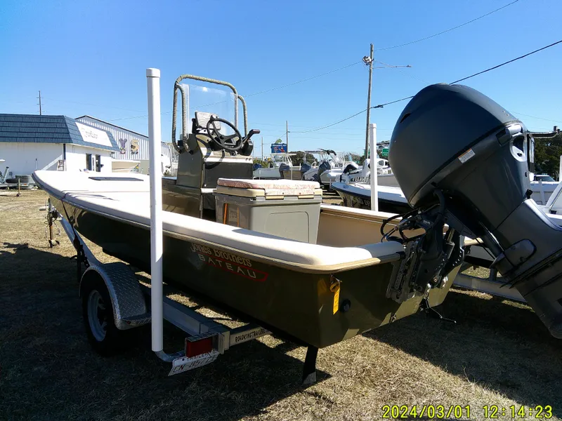 Slide: The Image of 2017 Jones Brothers 17 BATEAU boat on trailer, outdoor display. - 8