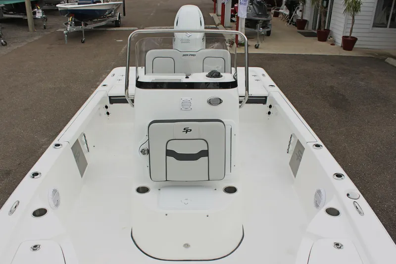Slide: The Image of 2025 Sea Pro 230 Bay boat interior with center console and seating. - 32