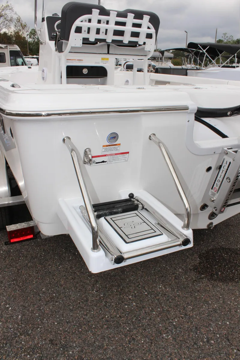 Slide: The Image of 2025 Sea Pro 230 Bay boat with rear swim platform and stainless steel rails. - 36
