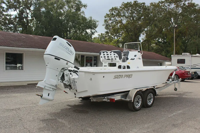 Slide: The Image of 2025 Sea Pro 230 Bay boat on trailer with Suzuki outboard motor. - 6