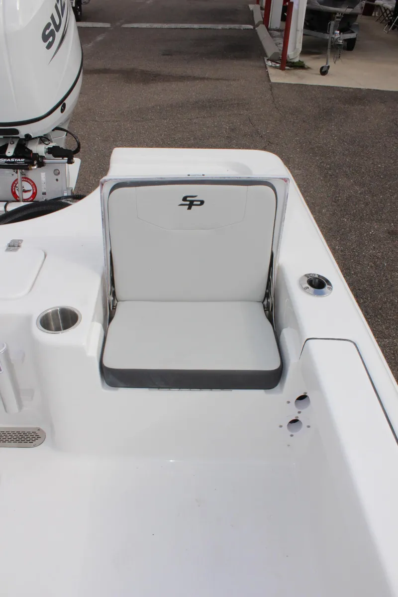 Slide: The Image of 2025 Sea Pro 230 Bay boat seat with logo, featuring sleek white design. - 9
