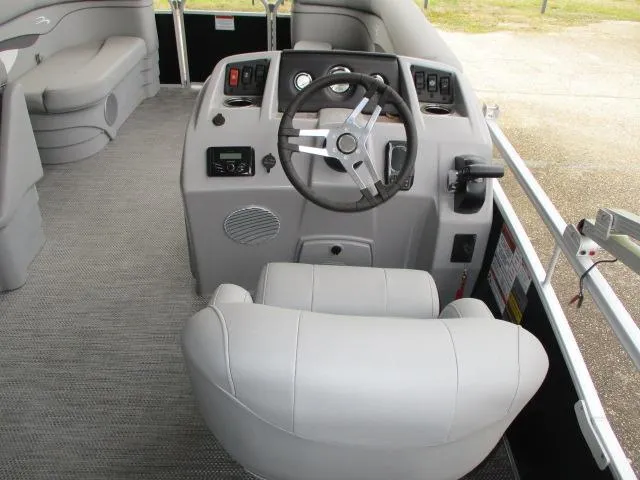 Slide: The Image of 2024 Bennington 188SV boat interior with steering wheel and seating. - 4