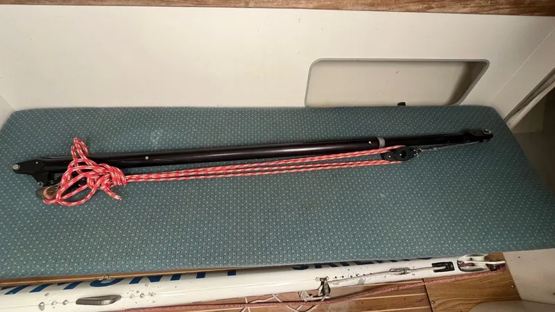 Slide: The Image of Boom vang with red rope on J Boats J/105, 2001 model. - 19