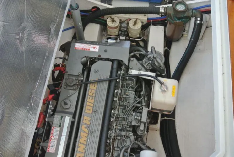 Slide: The Image of Engine compartment of a 2005 True North 38 Heritage boat with Yanmar diesel engine. - 22