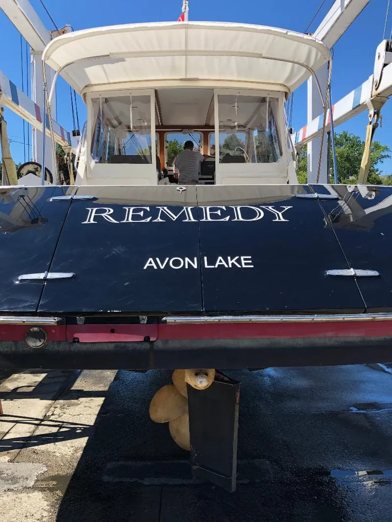 Slide: The Image of True North 38 Heritage 2005 boat named "Remedy" at Avon Lake in dry dock. - 5