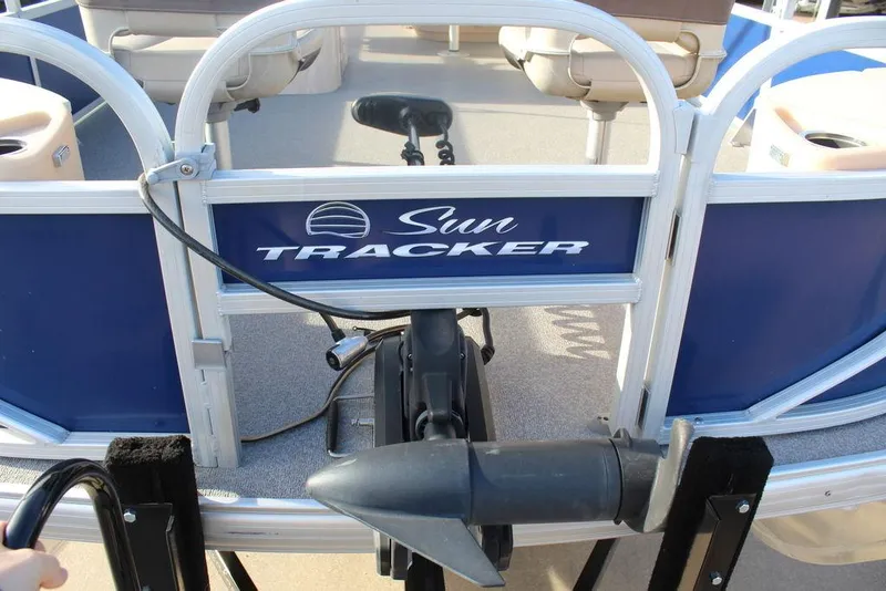 Slide: The Image of 2017 Tracker PARTY BARGE® 22 DLX pontoon boat rear view with motor and seating. - 11