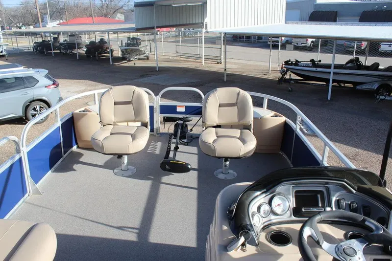 Slide: The Image of 2017 Tracker PARTY BARGE® 22 DLX pontoon boat with seating and steering console. - 19