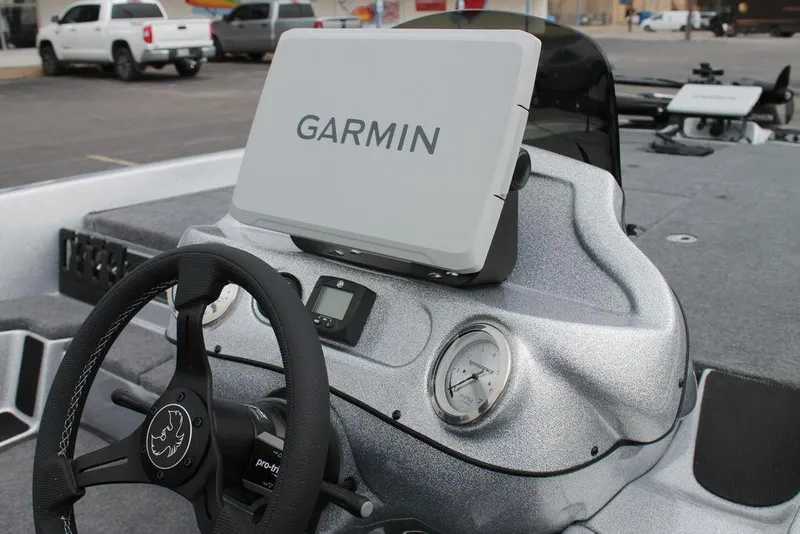 Slide: The Image of 2025 Phoenix 921 Elite II boat dashboard with Garmin navigation system. - 12