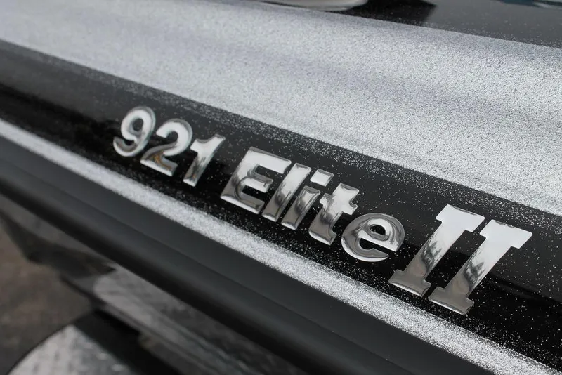 Slide: The Image of 2025 Phoenix 921 Elite II logo on metallic surface. - 13