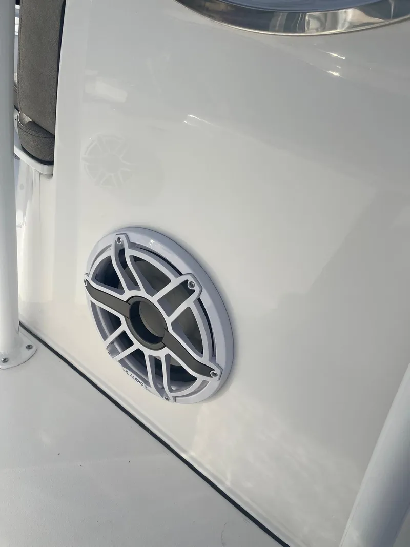 Slide: The Image of 2025 Sea Pro 250 Bay boat speaker detail on white surface. - 7