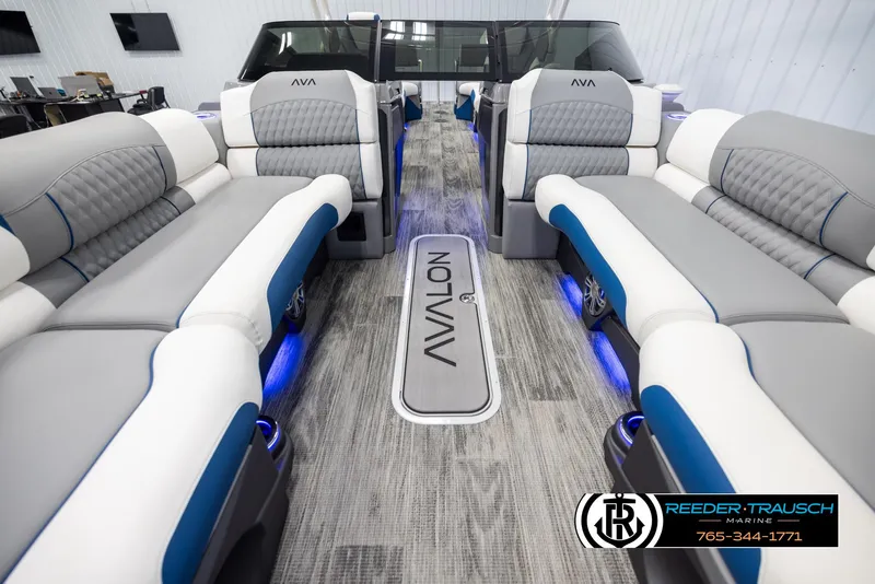 Slide: The Image of Luxurious interior of 2025 Avalon Excalibur LTD QLW boat with modern seating and ambient lighting. - 13
