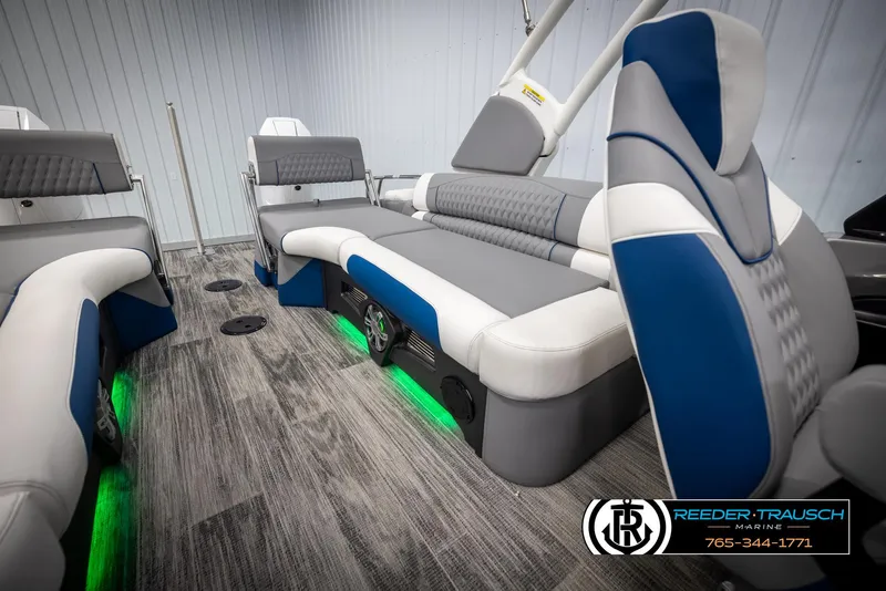 Slide: The Image of 2025 Avalon Excalibur LTD QLW interior with modern seating and ambient lighting. - 22
