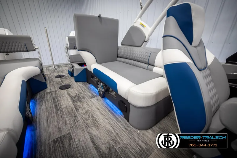 Slide: The Image of Luxurious interior of 2025 Avalon Excalibur LTD QLW boat with blue LED lighting. - 25