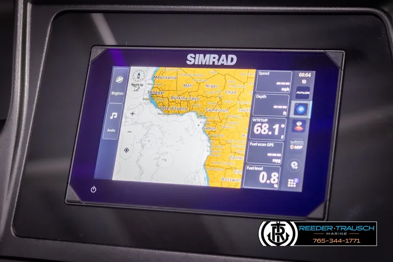 Slide: The Image of Simrad navigation display in 2025 Avalon Excalibur LTD QLW boat, showing map and speed data. - 31