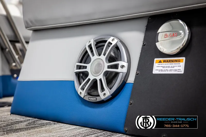 Slide: The Image of Speaker and gas cap on 2025 Avalon Excalibur LTD QLW boat interior. - 44