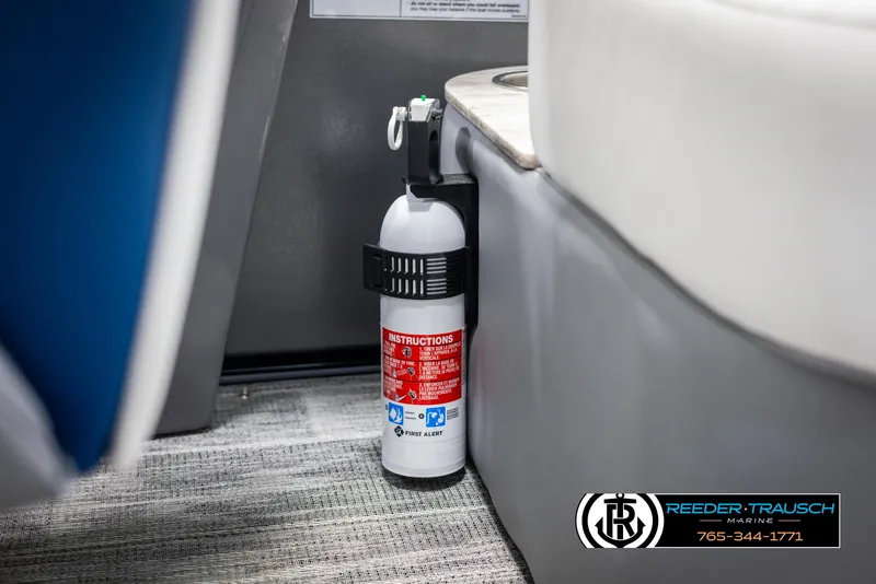 Slide: The Image of Fire extinguisher mounted in Avalon Excalibur LTD QLW 2025 interior, near seating area. - 46