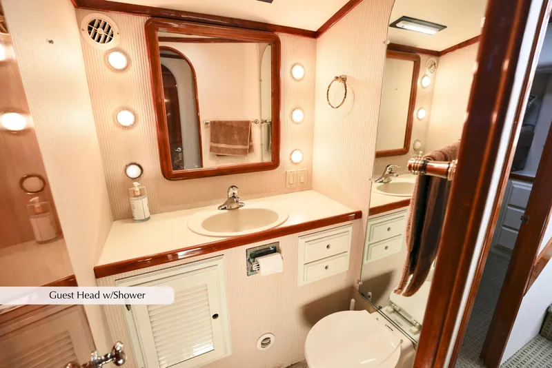 Slide: The Image of Luxurious 1996 Mediterranean convertible yacht bathroom with elegant wood accents and modern fixtures. - 32