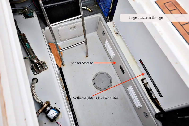 Slide: The Image of 1996 Mediterranean convertible boat lazarette storage with anchor and Northern Lights 16kw generator. - 36