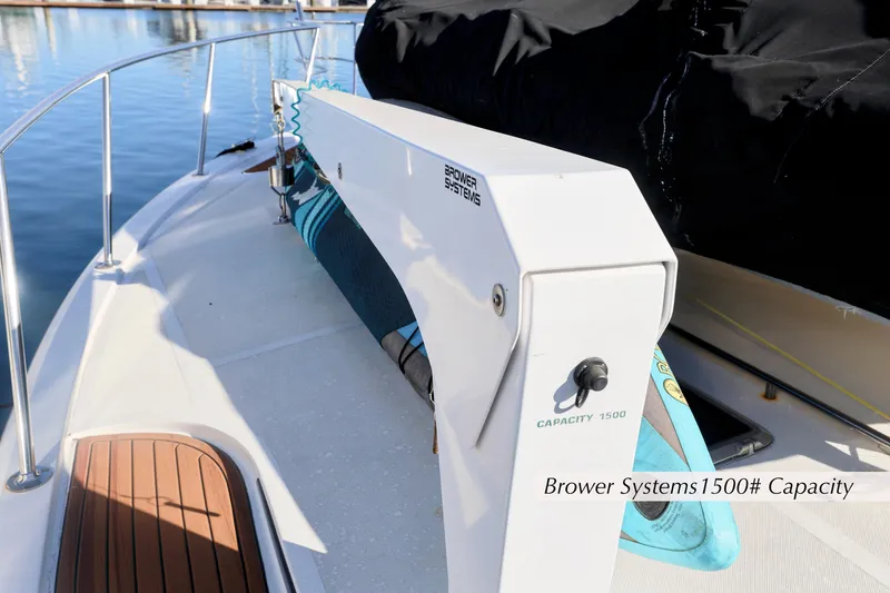 Slide: The Image of 1996 Mediterranean convertible boat with Brower Systems crane, 1500-pound capacity, docked at marina. - 5