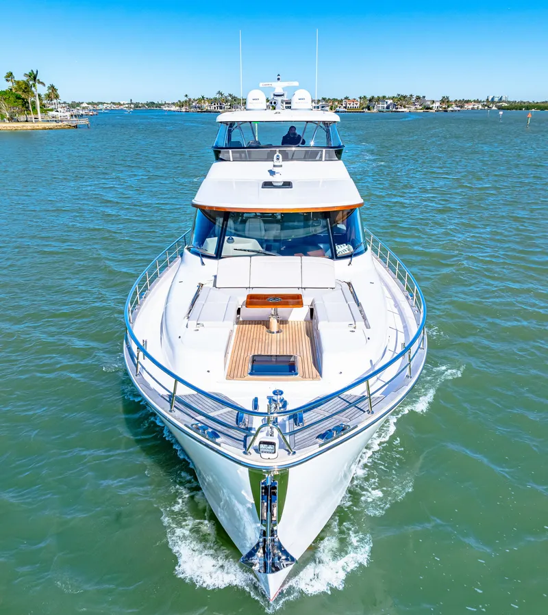 Slide: The Image of 2025 Belize 66 Daybridge yacht cruising on a sunny day in open waters. - 15