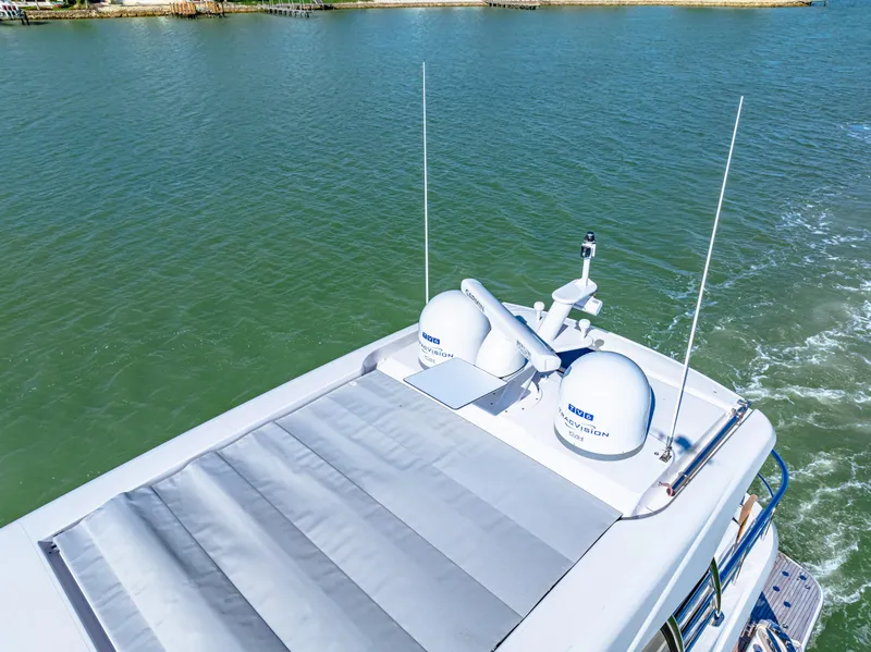 Slide: The Image of 2025 Belize 66 Daybridge yacht with advanced navigation equipment on calm waters. - 17