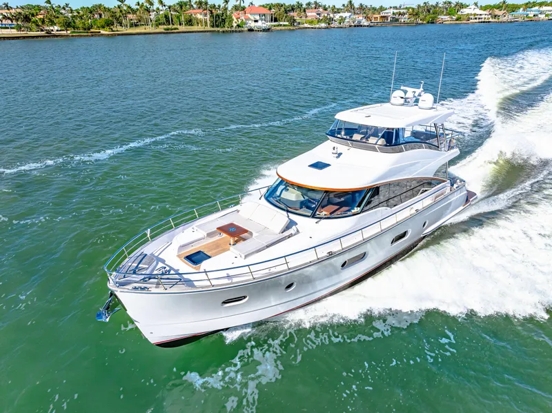 Slide: The Image of 2025 Belize 66 Daybridge luxury yacht cruising on a sunny day. - 23