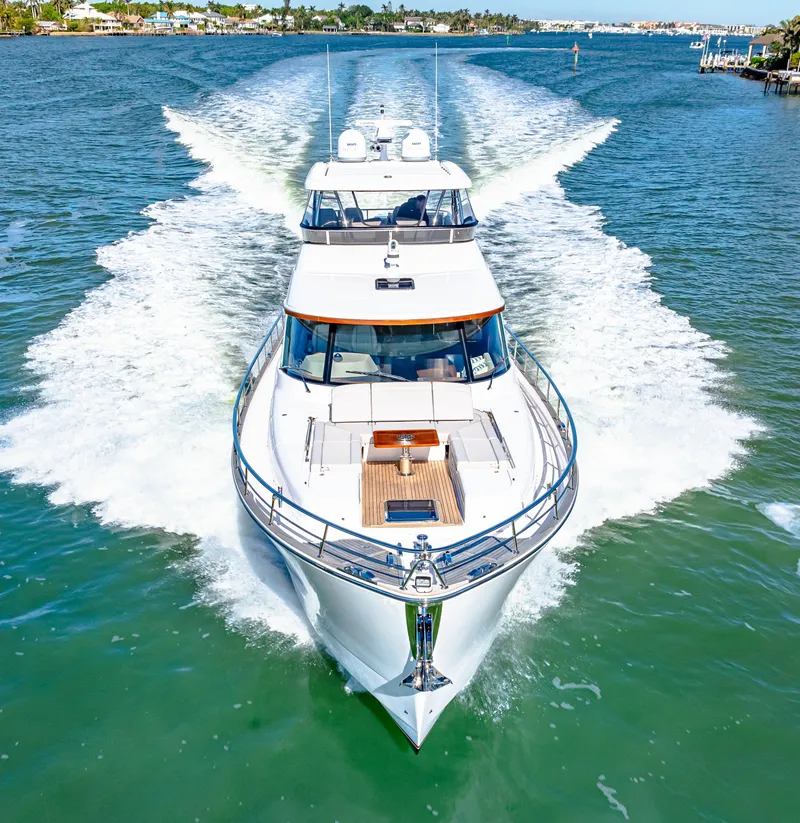 Slide: The Image of 2025 Belize 66 Daybridge yacht cruising on a sunny day, showcasing sleek design and powerful performance. - 25