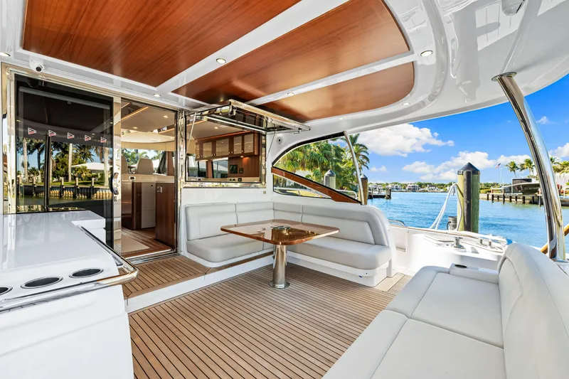 Slide: The Image of Luxurious 2025 Belize 66 Daybridge yacht interior with elegant seating and scenic waterfront view. - 34