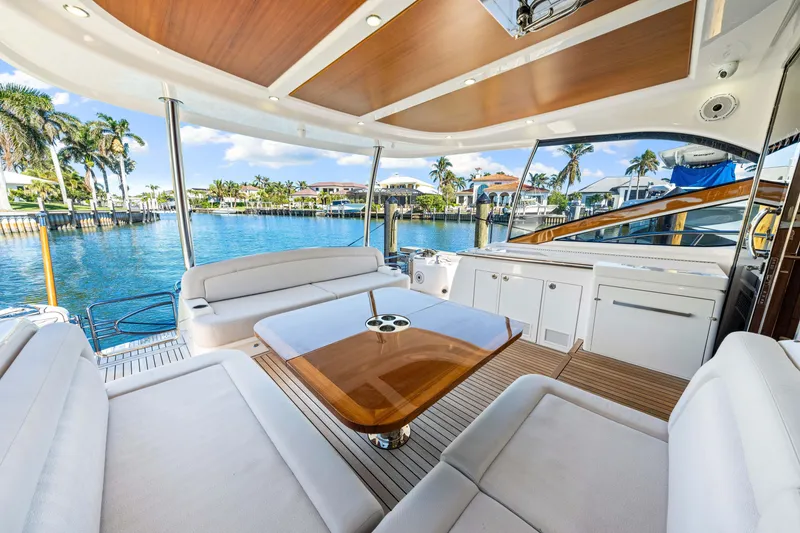 Slide: The Image of Luxurious 2025 Belize 66 Daybridge yacht interior with elegant seating and scenic waterfront view. - 37
