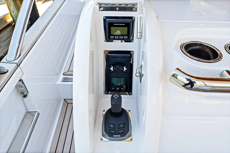 Slide: The Image of Control panel of 2025 Belize 66 Daybridge yacht with joystick and display. - 39
