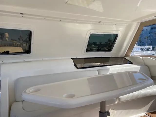 Slide: The Image of Interior of 2002 Silverton 453 Motor Yacht with seating and table. - 10