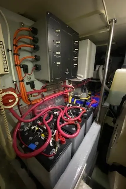 Slide: The Image of Engine room of 2002 Silverton 453 Motor Yacht with battery setup and wiring. - 31