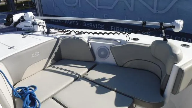 Slide: The Image of 2021 Key West 263FS boat interior with seating and fishing equipment. - 10