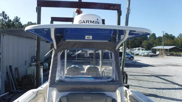 Slide: The Image of 2021 Key West 263FS boat with Garmin equipment, docked in a marina. - 11
