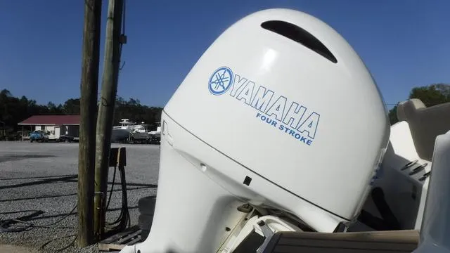 Slide: The Image of Yamaha four-stroke outboard engine on a 2021 Key West 263FS boat. - 6