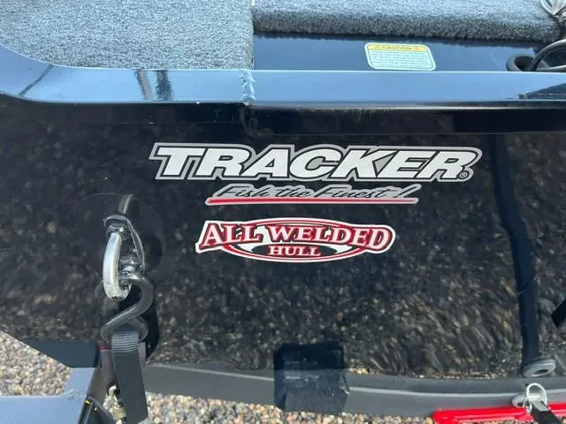 Slide: The Image of 2018 Tracker Pro Guide V-16 SC boat with "All Welded Hull" label. - 6