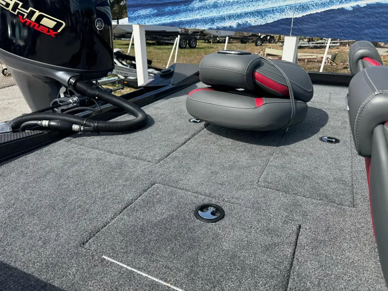 Slide: The Image of 2025 Ranger RT188C boat deck with cushioned seating and Yamaha VMAX engine. - 8