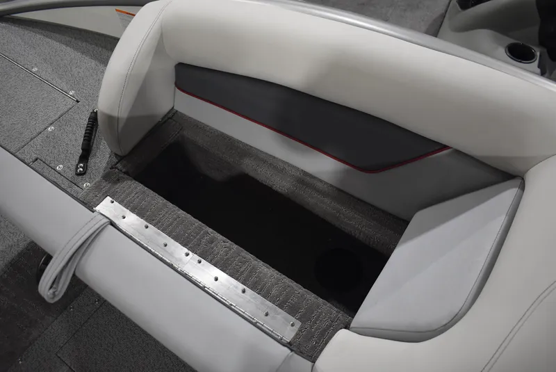 Slide: The Image of 2025 Lowe SD224 Sport Deck boat interior with open storage compartment. - 15