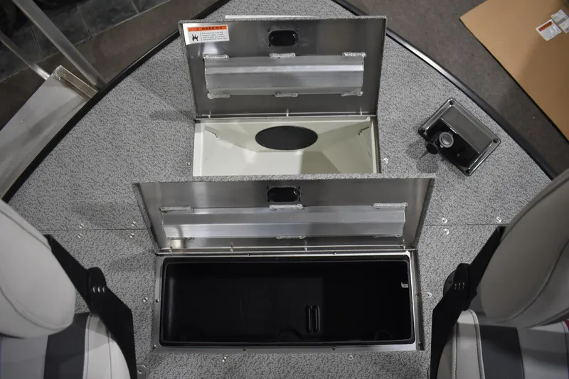 Slide: The Image of 2025 Lowe SD224 Sport Deck boat storage compartments with open lids, showcasing interior space. - 20