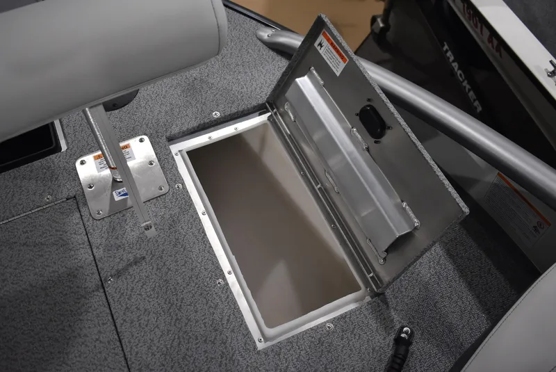 Slide: The Image of 2025 Lowe SD224 Sport Deck boat storage compartment with open hatch. - 23