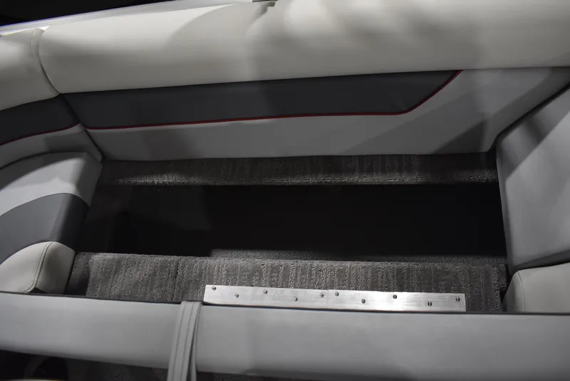 Slide: The Image of 2025 Lowe SD224 Sport Deck interior seating with gray and white upholstery. - 8