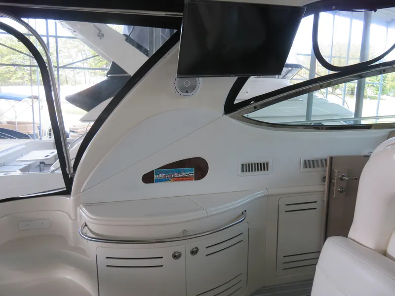Slide: The Image of Interior of a 2001 Sea Ray 510DA yacht with modern amenities and sleek design. - 7
